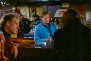 Hank Garrett as Bartender in The Amityville Horror (1979).